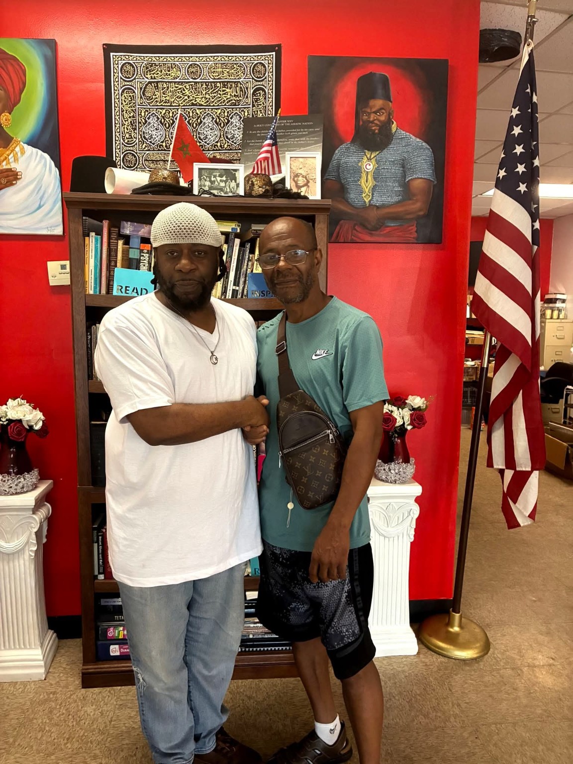 Friends greeting one another in the barbershop